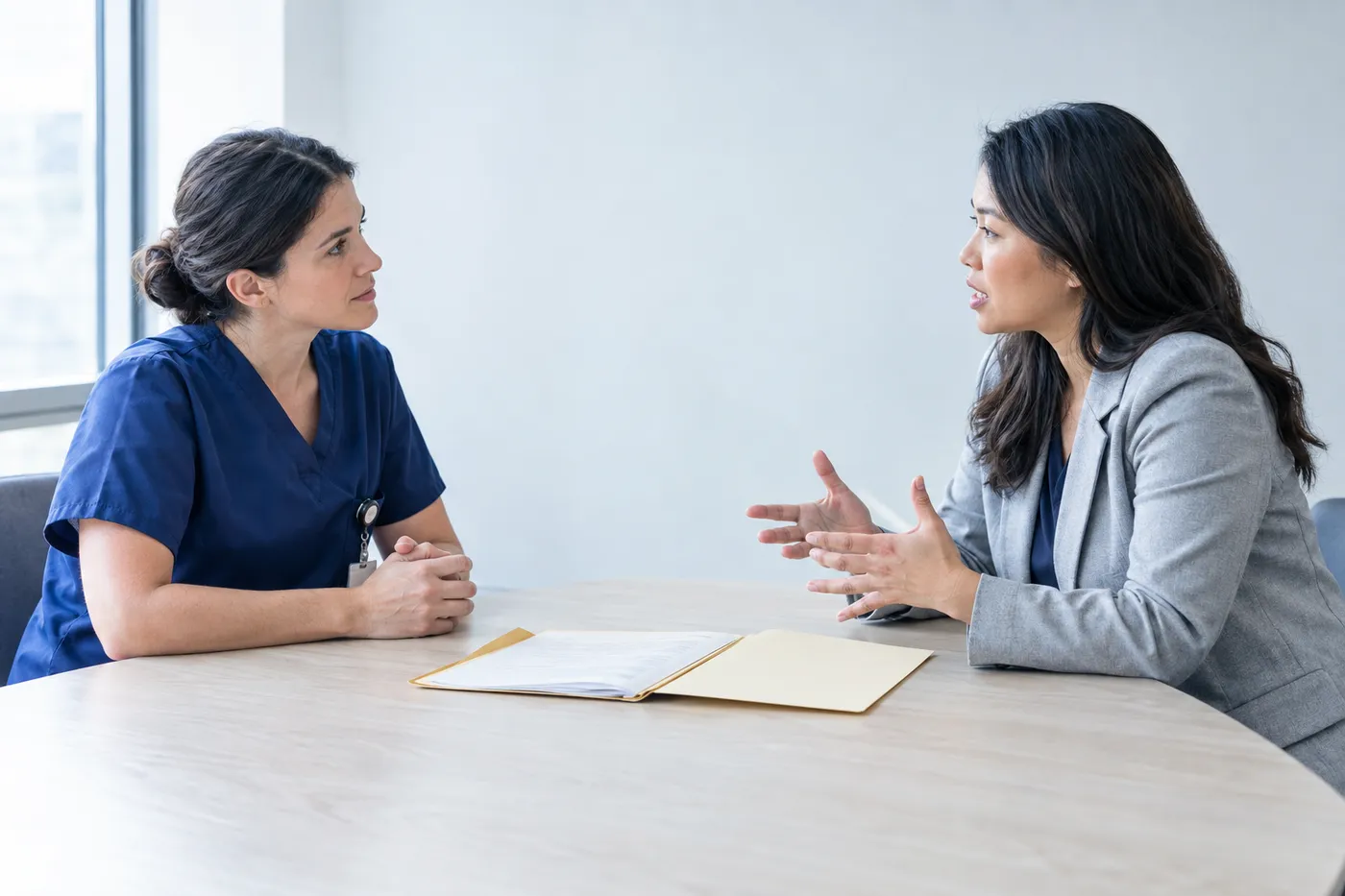 A candidate shares an authentic clinical story with a nurse manager during a nursing job interview.